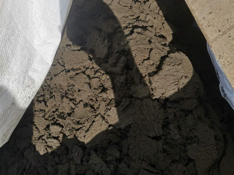 Sludge reduction system for treating construction sludge